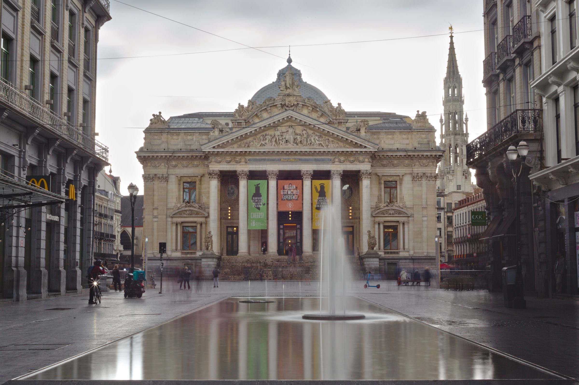 The columned facade of the former stock exchange building in central Brussels