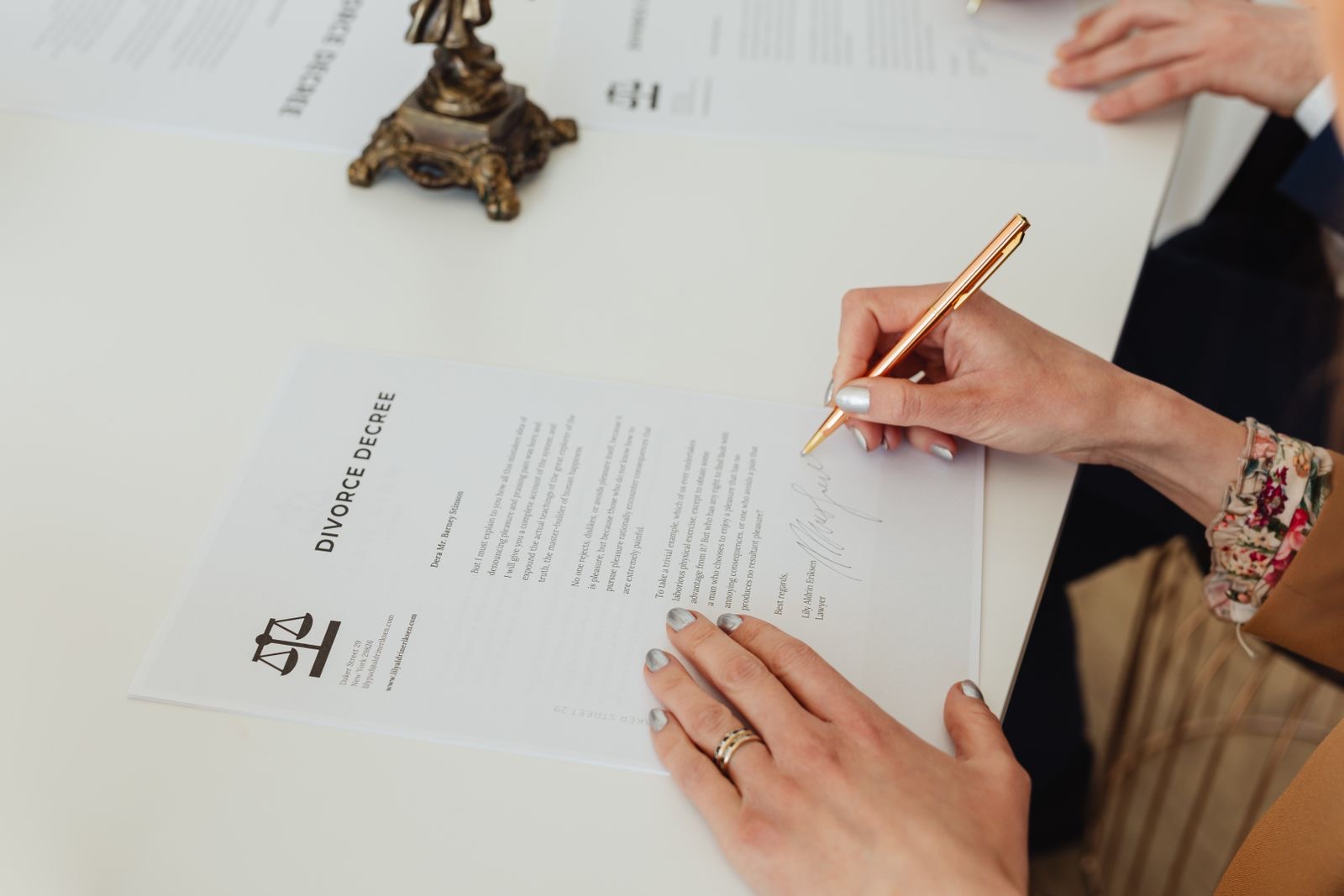 A signed resolution and a corporate records binder on a desk