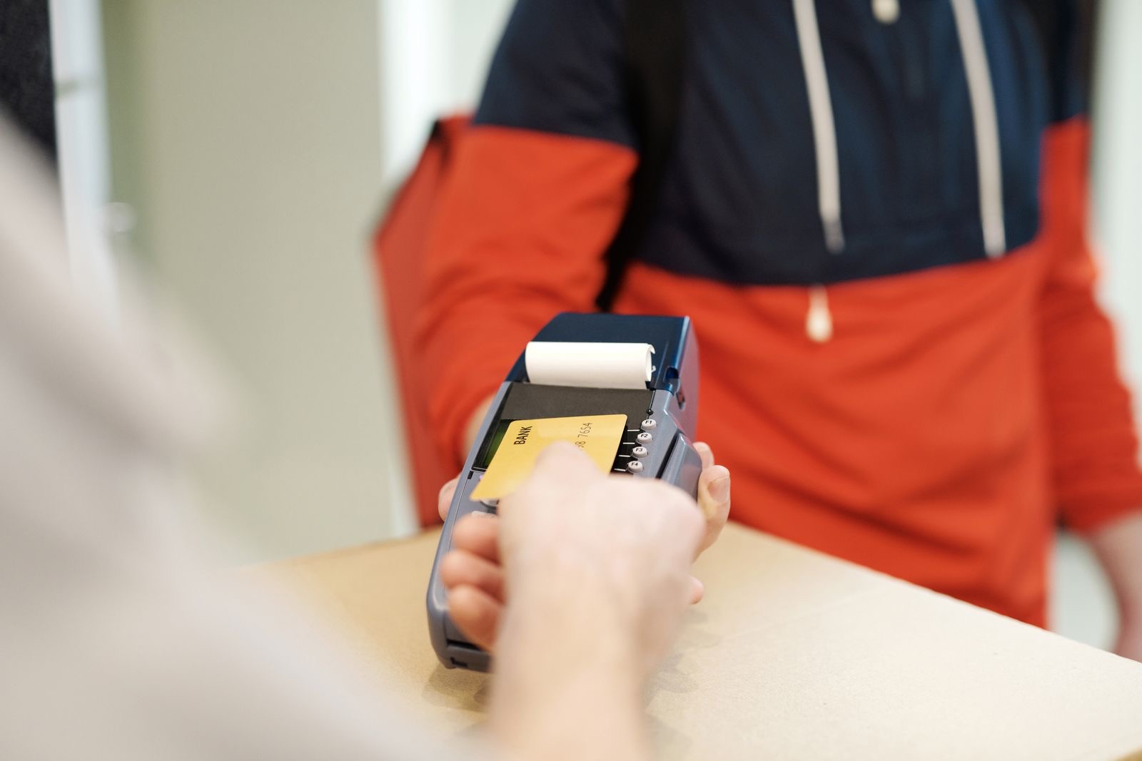 Contactless card held to a payment terminal