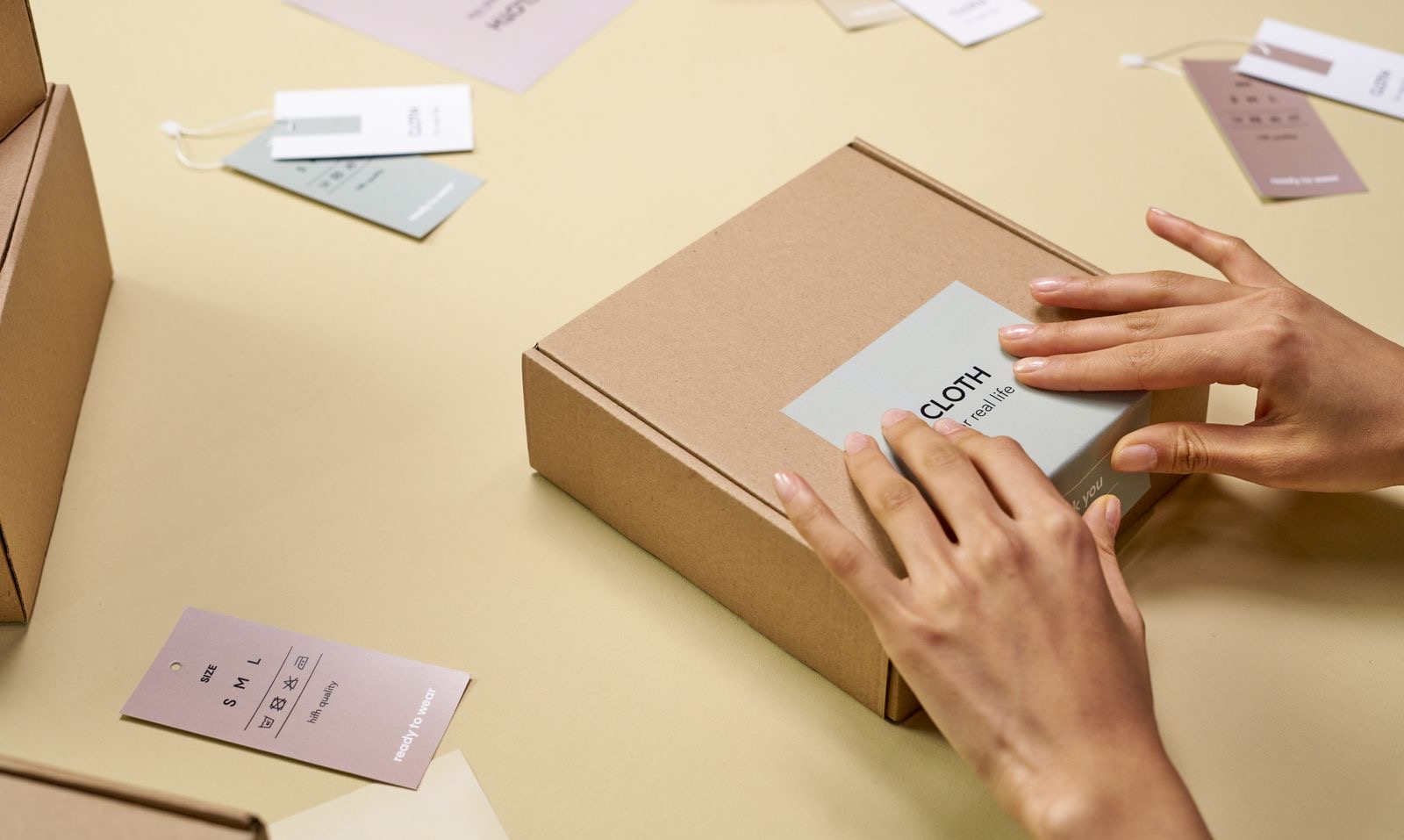 Hand-labelled product packaging on a small business workbench